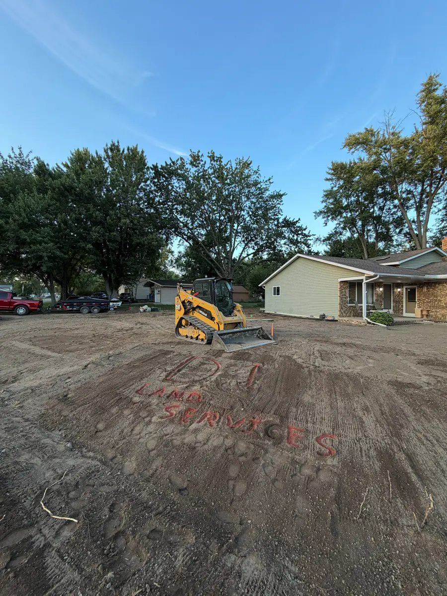 During — Full yard stripped, regraded, and sodded, front to back