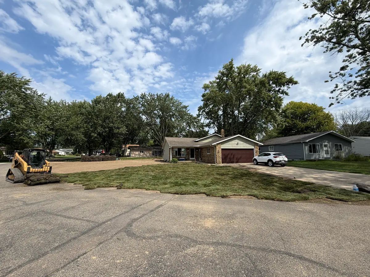 During — Full yard stripped, regraded, and sodded, front to back