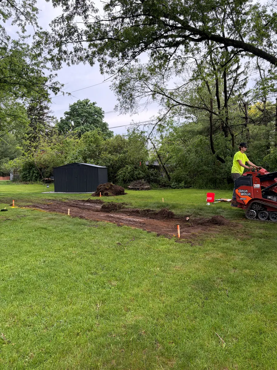 During — Above-ground pool pad cut, leveled, and screeded
